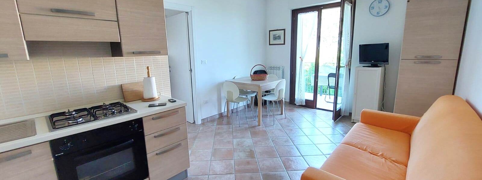 TRILOCALE CON CANTINA E POSTO AUTO